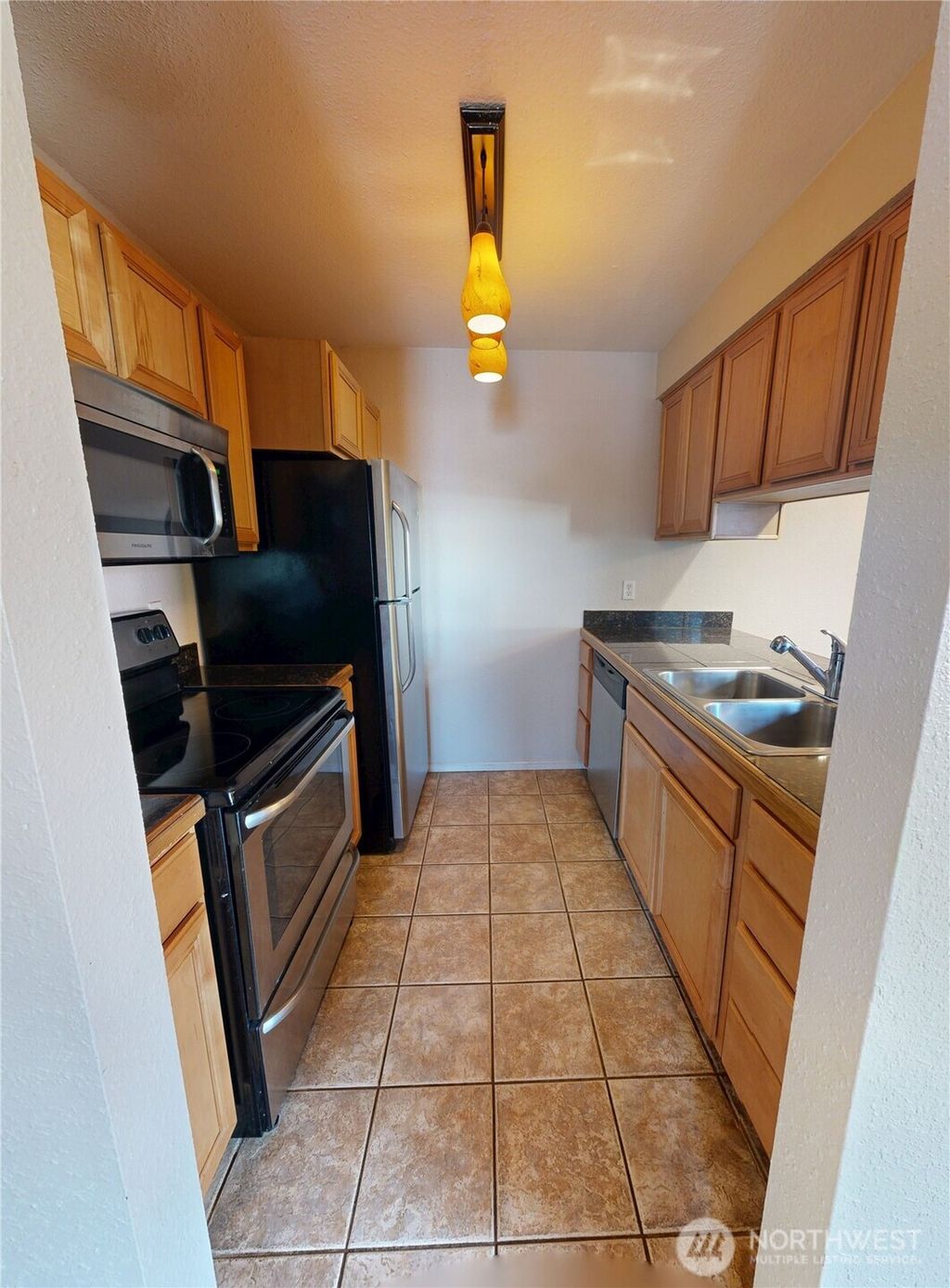 Photo of 3233 NE 12th Street #301, Renton, WA 98056 (MLS # 2448412)