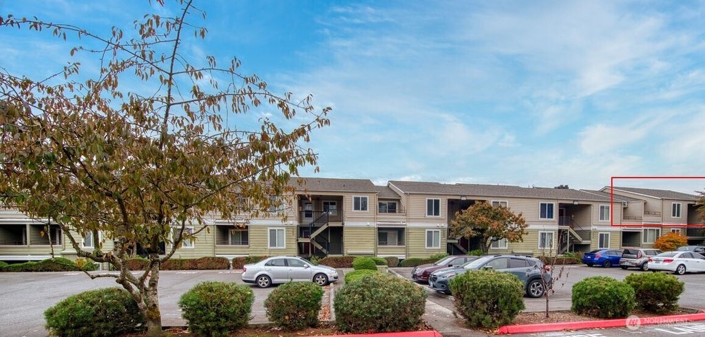 Photo of 3233 NE 12th Street #301, Renton, WA 98056 (MLS # 2448412)
