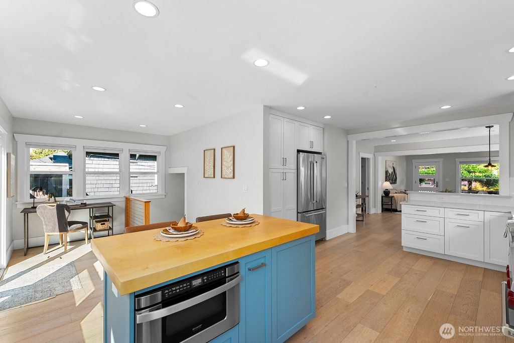 Photo of 5811 1st Avenue NE, Seattle, WA 98105 (MLS # 2437240)