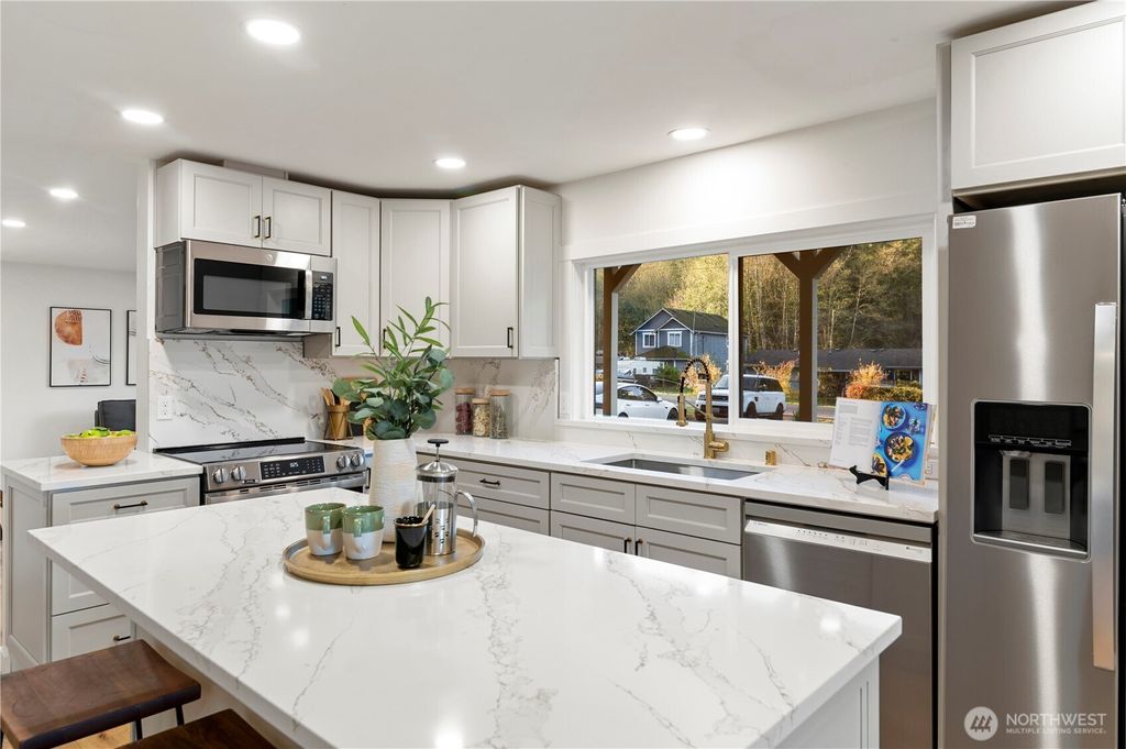 Photo of 20909 Frank Waters Road, Stanwood, WA 98292 (MLS # 2454068)