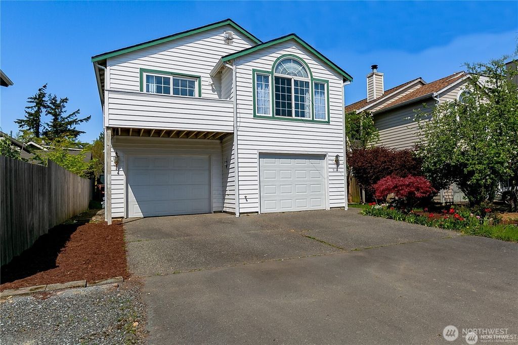 Photo of 512 N 104th Street St, Seattle, WA 98133 (MLS # 2430565)