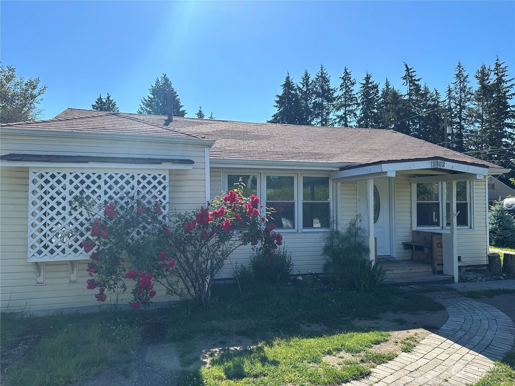 Photo of 12302 5th Avenue NE, Seattle, WA 98125 (MLS # 2256750)