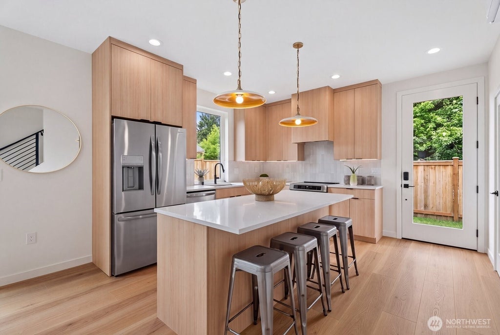 Photo of 7513 12th Avenue SW, Seattle, WA 98106 (MLS # 2580085)