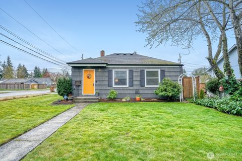 Photo of 4802 S Grove Place, Tacoma, WA 98409 (MLS # 2502009)
