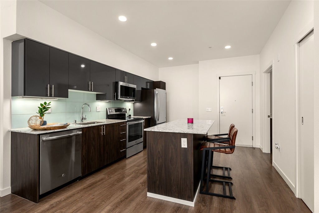 Photo of 1085 103rd Avenue NE #113, Bellevue, WA 98004 (MLS # 2599228)