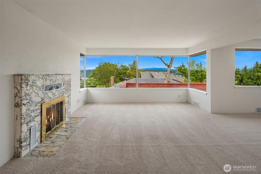 Photo of 5235 S Graham Street, Seattle, WA 98118 (MLS # 2528125)
