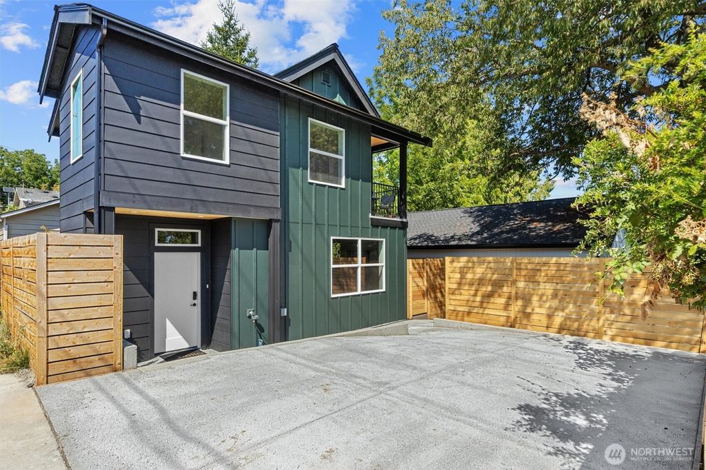 Photo of 7713 34th Avenue SW, Seattle, WA 98126 (MLS # 2410993)