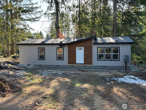 Photo of 512 E Madrona Parkway, Grapeview, WA 98546 (MLS # 2441468)