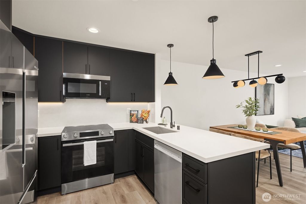 Photo of 12012 17th Place S #B, Burien, WA 98168 (MLS # 2508469)