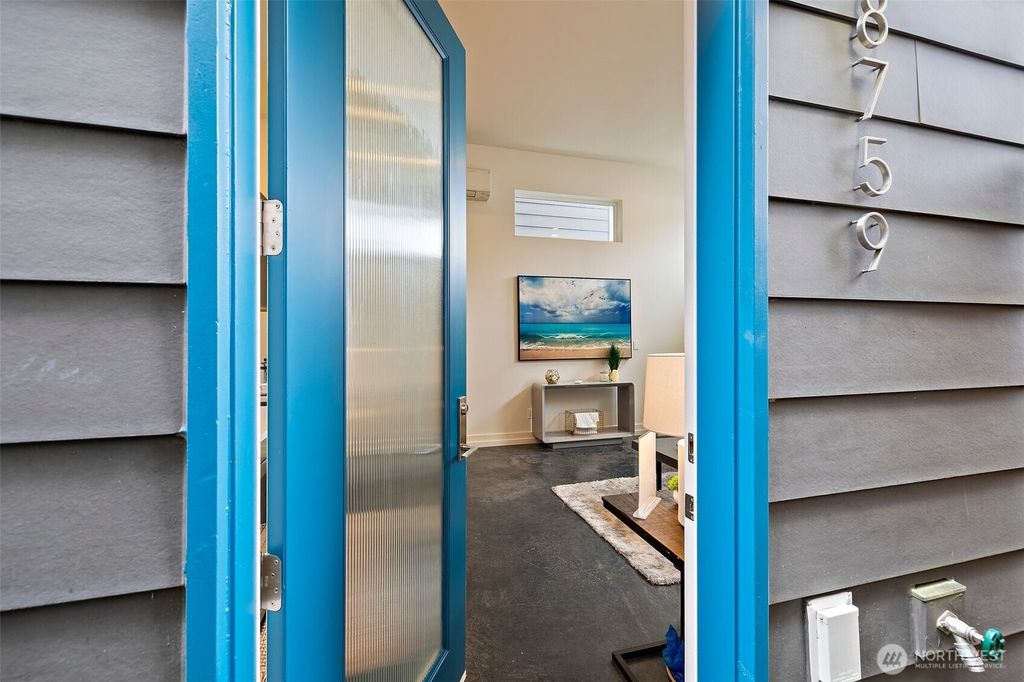 Photo of 8759 15th Avenue NW, Seattle, WA 98117 (MLS # 2341492)