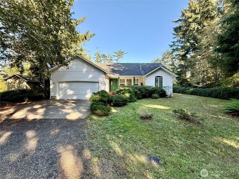 Photo of 736 Duck Lake Drive SE, Ocean Shores, WA 98569 (MLS # 2439400)