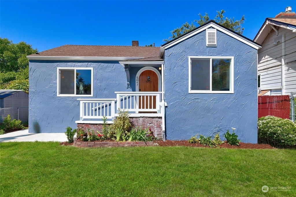 Photo of 8847 10th Avenue SW, Seattle, WA 98106 (MLS # 2077669)