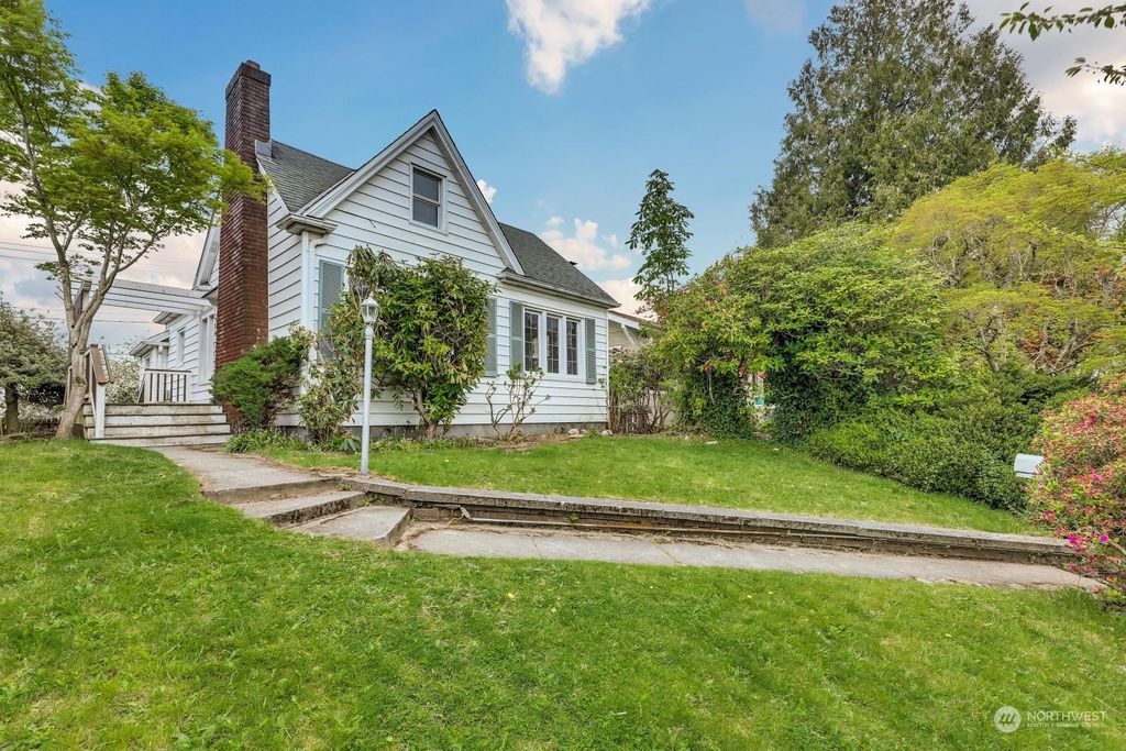 Photo of 5051 36th Avenue SW, Seattle, WA 98126 (MLS # 2050826)