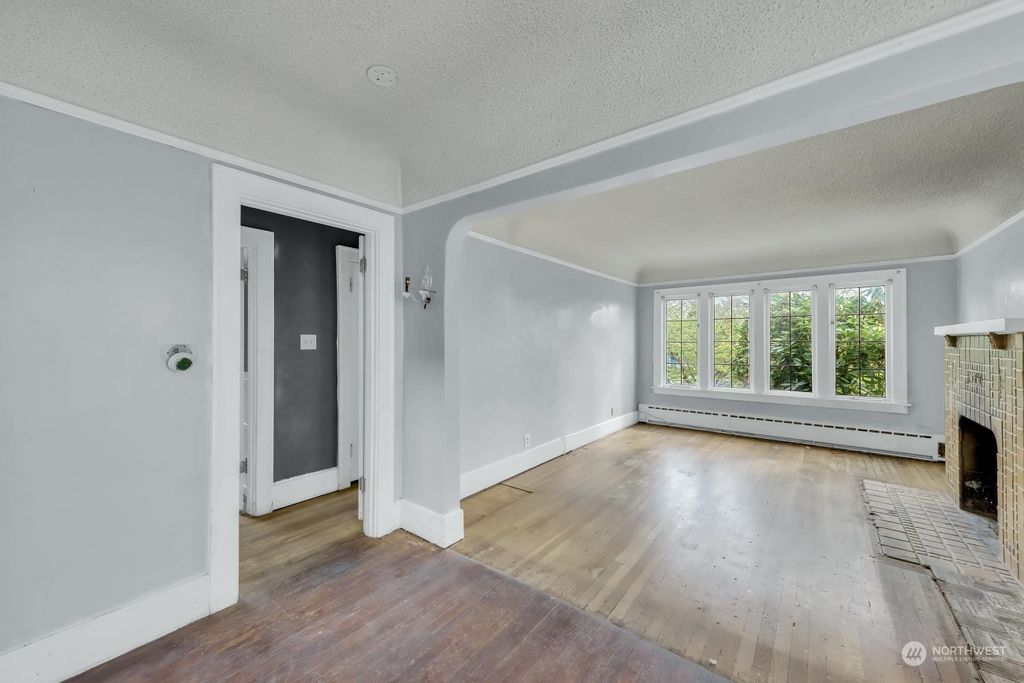 Photo of 5051 36th Avenue SW, Seattle, WA 98126 (MLS # 2050826)