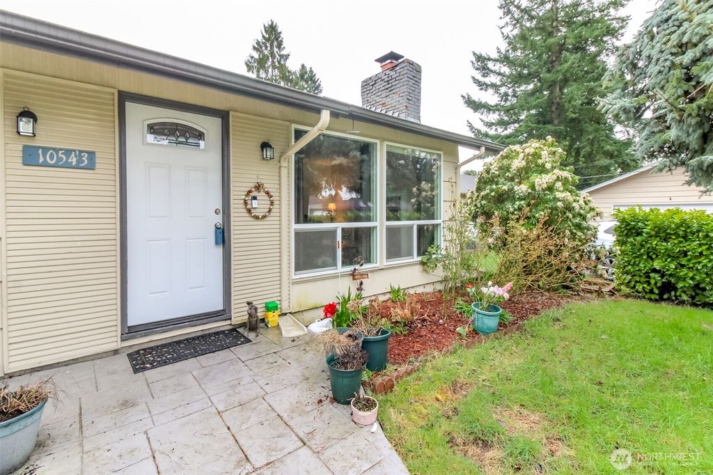 Photo of 10543 SE 228th Street, Kent, WA 98031 (MLS # 2501639)