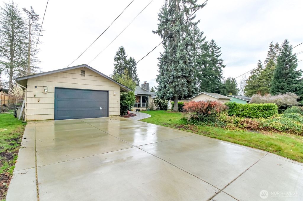 Photo of 10543 SE 228th Street, Kent, WA 98031 (MLS # 2501639)