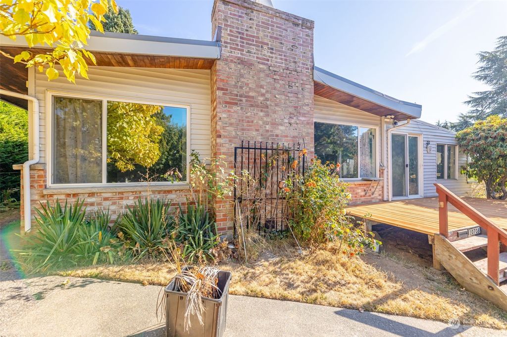 Photo of 10708 Palatine Avenue N, Seattle, WA 98133 (MLS # 2008332)