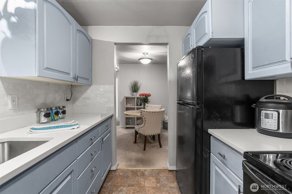 Photo of 15433 Country Club Drive #E105, Mill Creek, WA 98012 (MLS # 2373946)