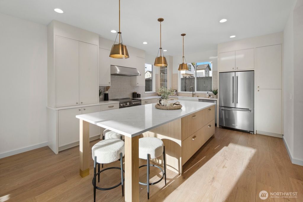 Photo of 10043 8th Avenue NW, Seattle, WA 98177 (MLS # 2465966)