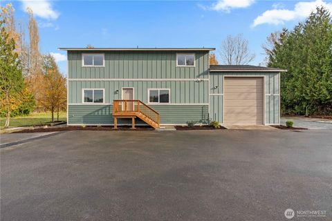 Photo of 907 Orting Kapowsin Highway E, Orting, WA 98360 (MLS # 2453381)