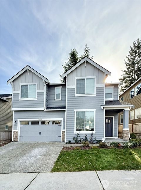Photo of 12002 10th Place SE Pl, Lake Stevens, WA 98258 (MLS # 2454539)
