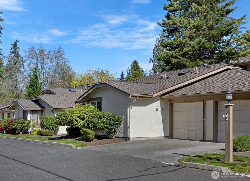 Photo of 16002 Village Green Drive #A, Mill Creek, WA 98012 (MLS # 2354209)