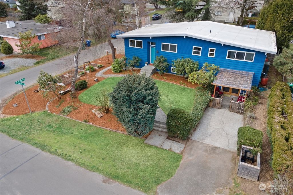 Photo of 10655 32nd Avenue SW, Seattle, WA 98146 (MLS # 2049901)