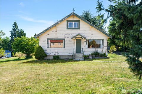 Photo of 211 Harrison Street, Raymond, WA 98577 (MLS # 2407123)