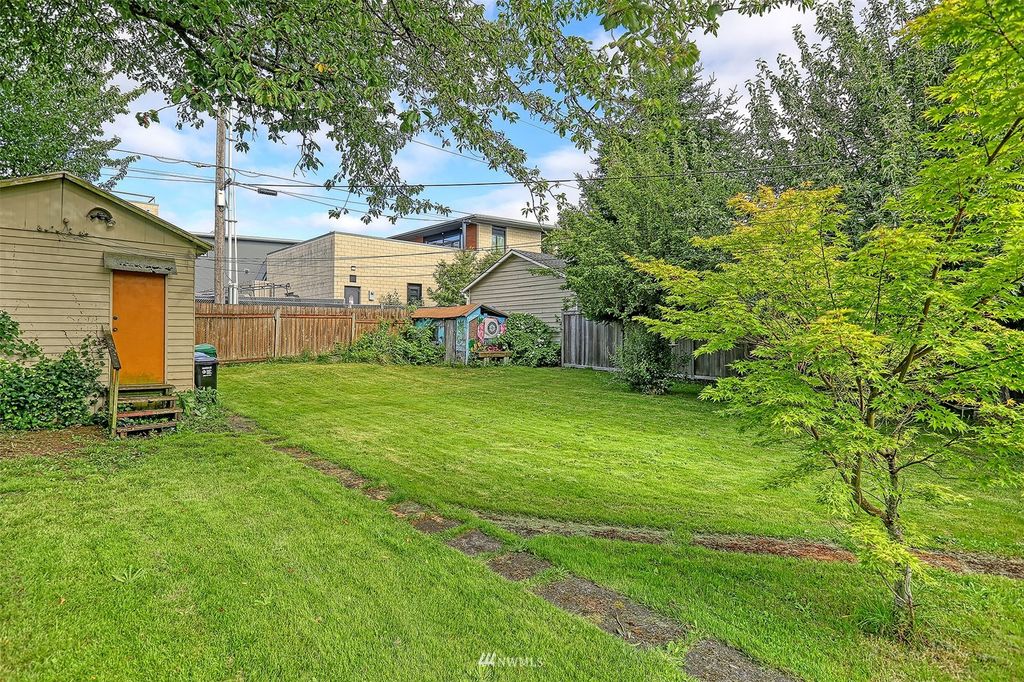 Photo of 7711 34th Avenue SW, Seattle, WA 98126 (MLS # 1970408)