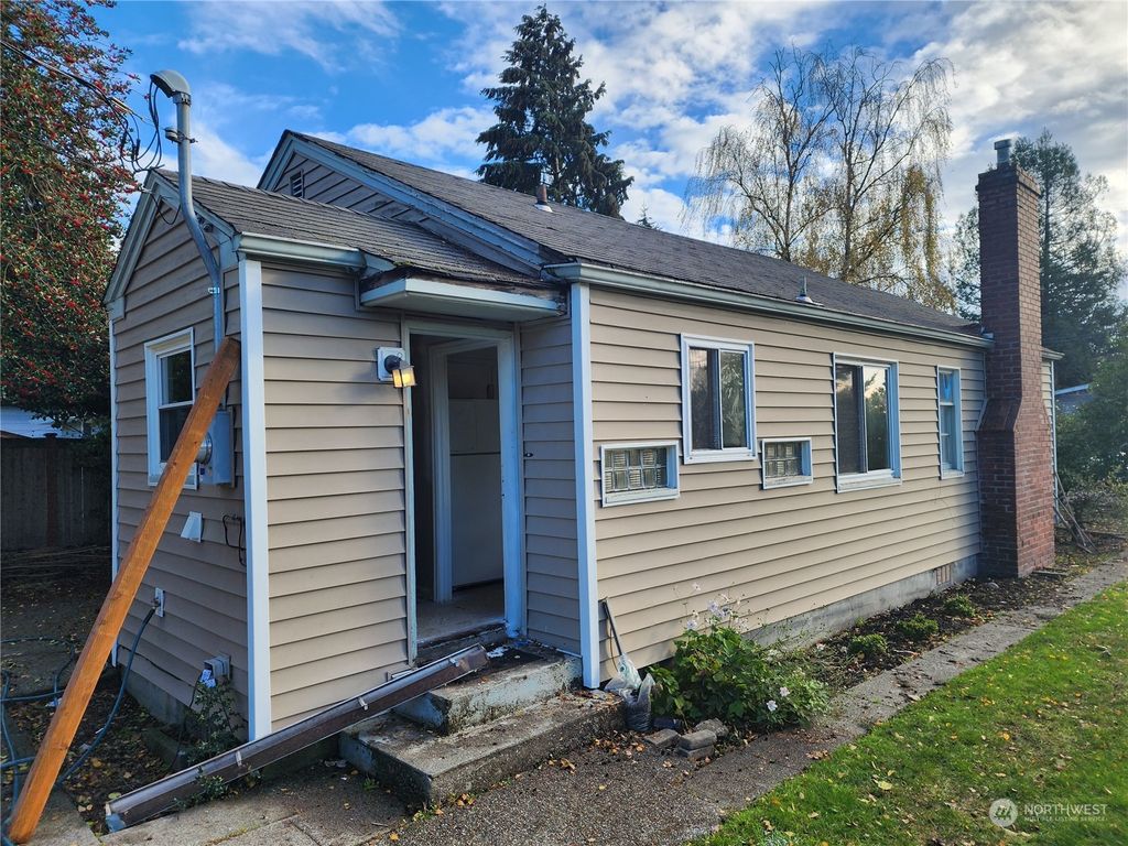 Photo of 502 N 104th Street, Seattle, WA 98133 (MLS # 2320259)