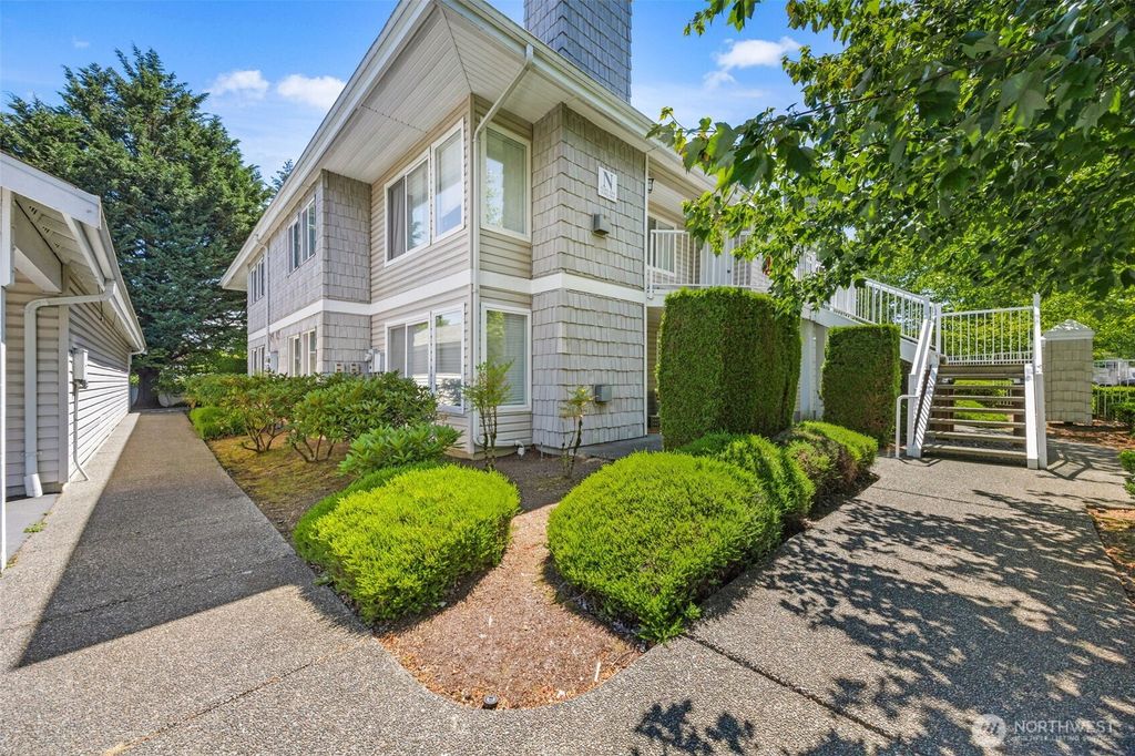 Photo of 11130 SE 208th Street #N101, Kent, WA 98031 (MLS # 2403219)
