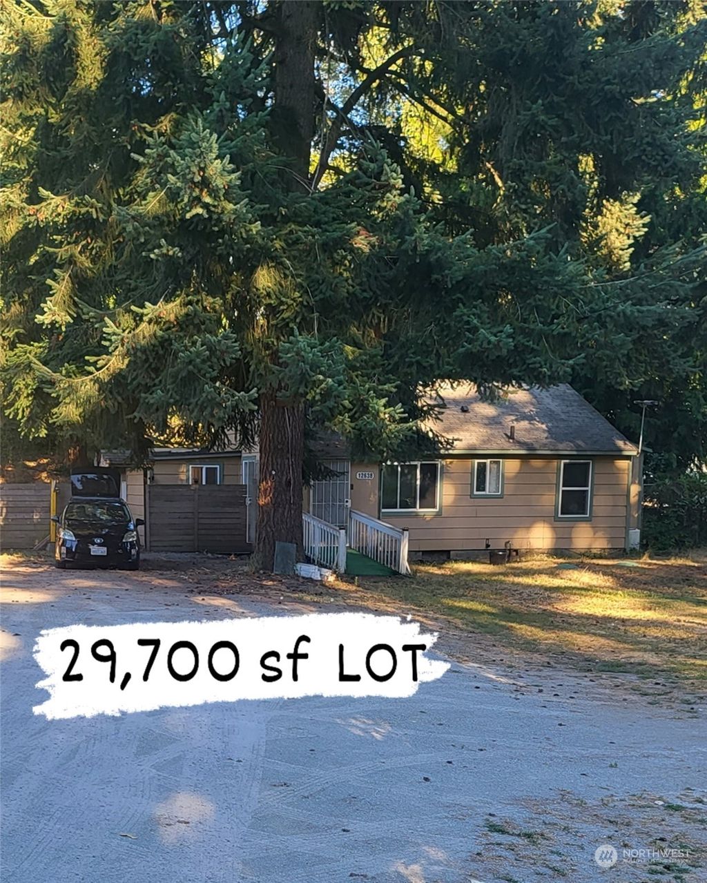 Photo of 12638 10th Avenue S, Seattle, WA 98168 (MLS # 2153318)