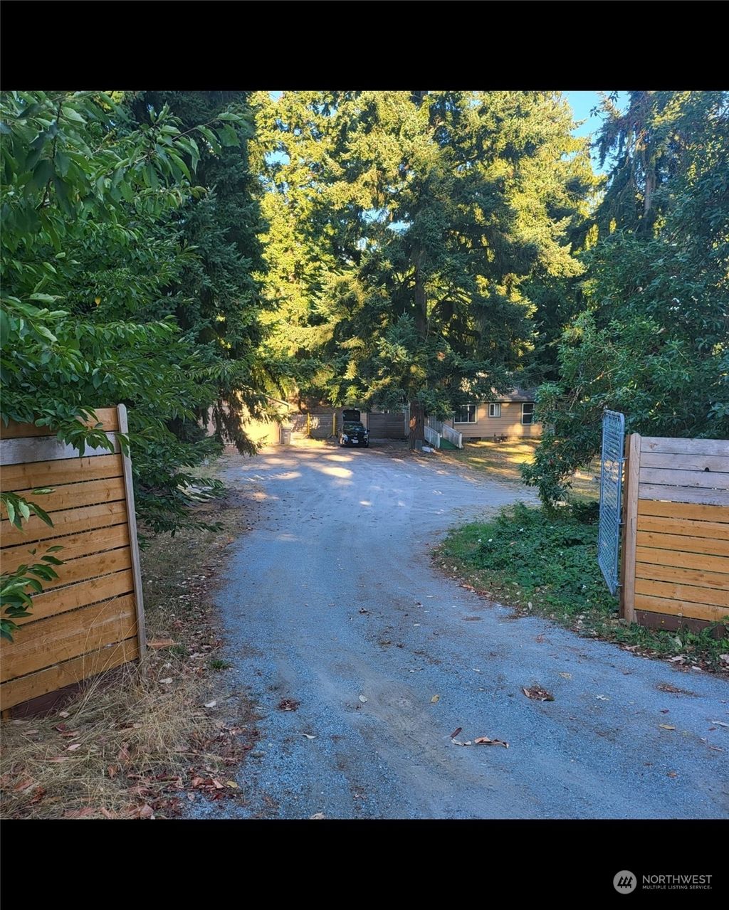 Photo of 12638 10th Avenue S, Seattle, WA 98168 (MLS # 2153318)