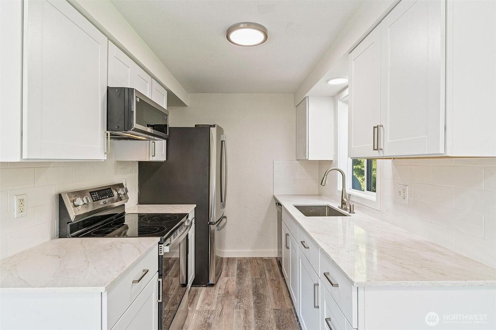Photo of 9126 1st Place NE #3, Lake Stevens, WA 98258 (MLS # 2411264)