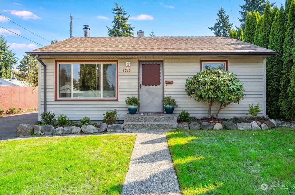 Photo of 9210 32nd Avenue SW, Seattle, WA 98126 (MLS # 2165131)