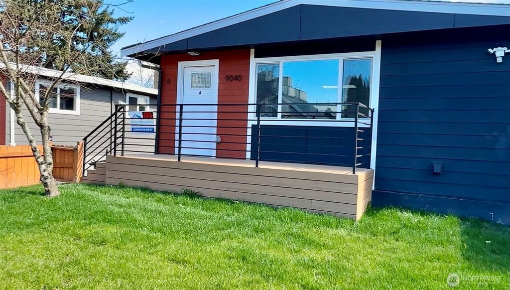 Photo of 9040 17th Avenue SW, Seattle, WA 98106 (MLS # 2499083)