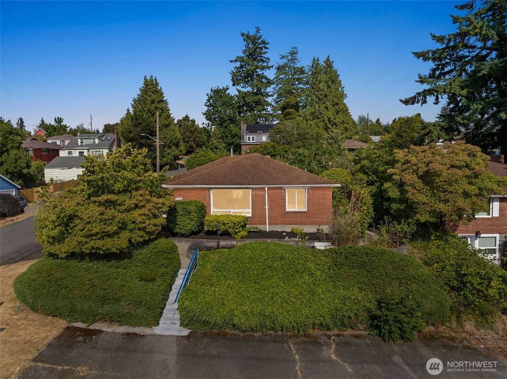Photo of 11758 1st Avenue NW, Seattle, WA 98177 (MLS # 2407835)