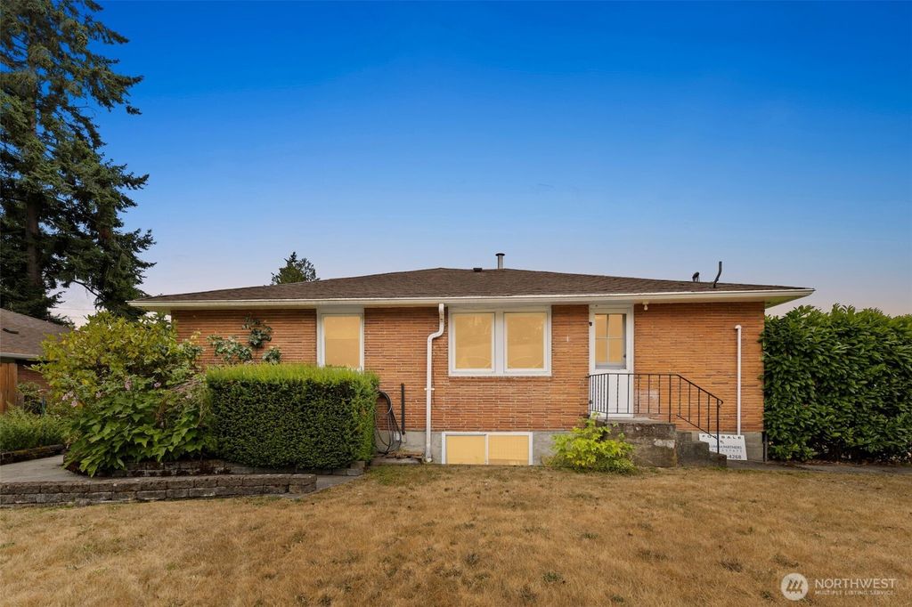 Photo of 11758 1st Avenue NW, Seattle, WA 98177 (MLS # 2407835)
