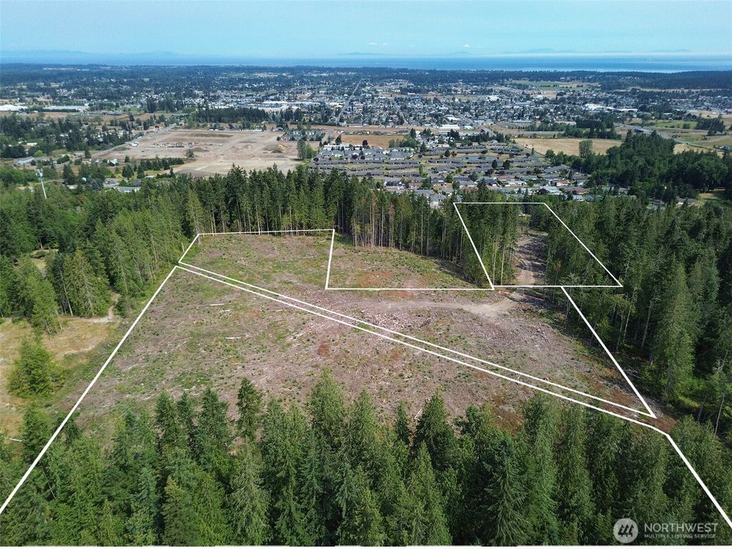 Photo of 319 W Reservoir Road, Sequim, WA 98382 (MLS # 2457892)