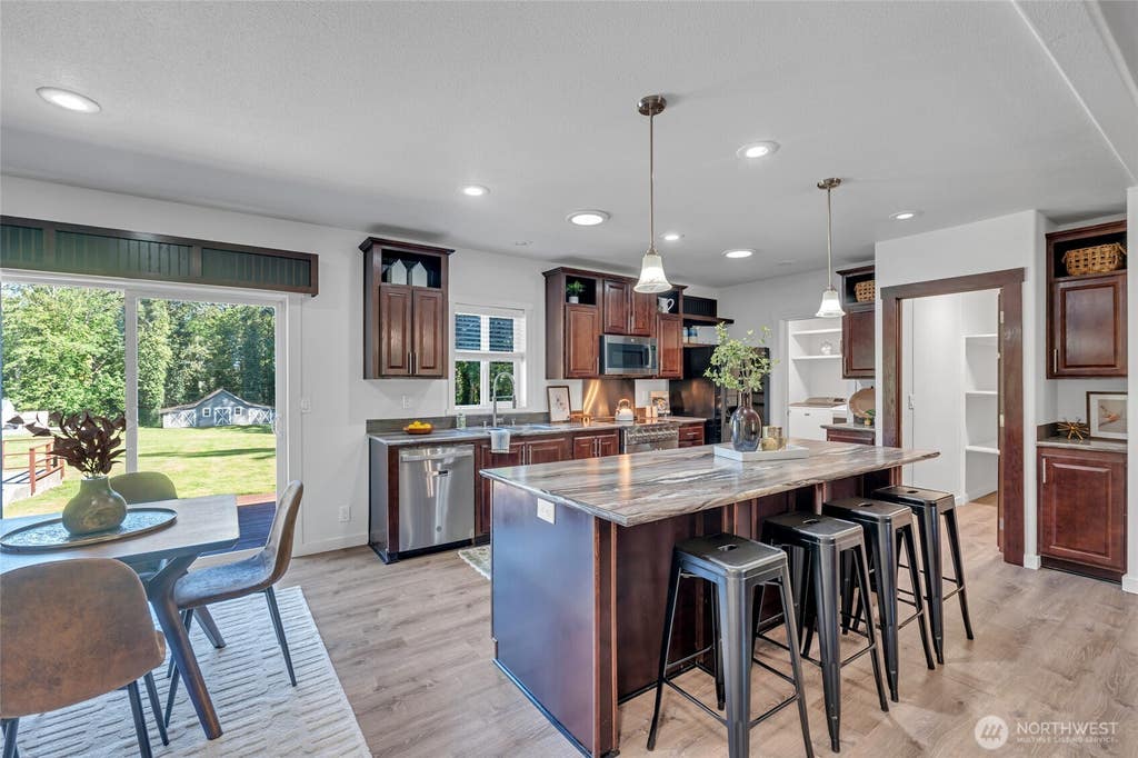 Photo of 9889 Sportsman Club Road RD NE, Bainbridge Island, WA 98110 (MLS # 2564783)
