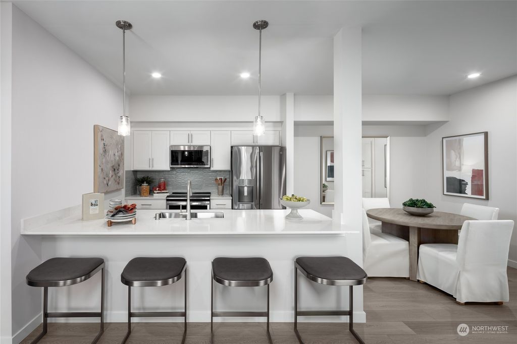 Photo of 1222 Confluence Way SE #102, North Bend, WA 98045 (MLS # 2311518)
