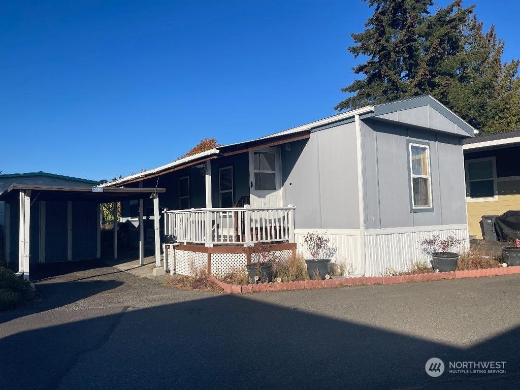 Photo of 3250 S 182nd Street, SeaTac, WA 98188 (MLS # 2043621)