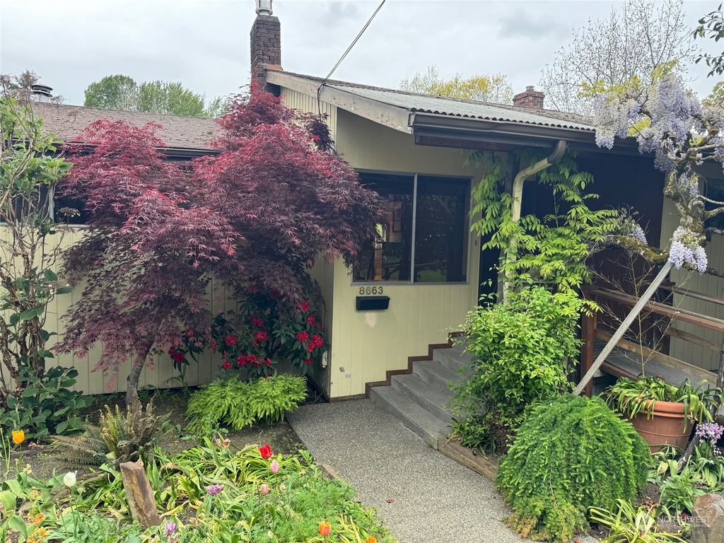 Photo of 8663 Island Drive S, Seattle, WA 98118 (MLS # 2233099)