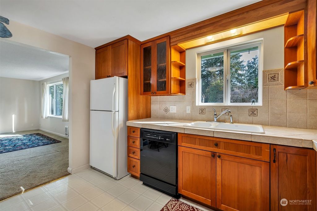 Photo of 4648 S 166th Street, SeaTac, WA 98188 (MLS # 2046405)