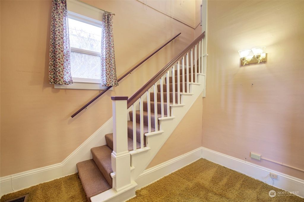 Photo of 6520 10th Avenue NW, Seattle, WA 98117 (MLS # 2030679)