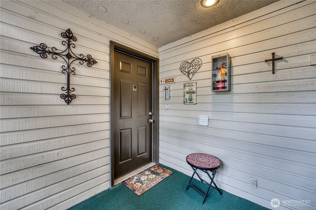 Photo of 20026 Viking's Crest Loop NE #1-203, Poulsbo, WA 98370 (MLS # 2517645)
