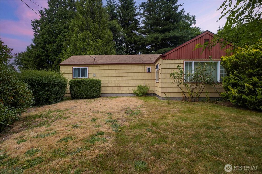 Photo of 10850 14th Avenue S, Seattle, WA 98168 (MLS # 2403361)