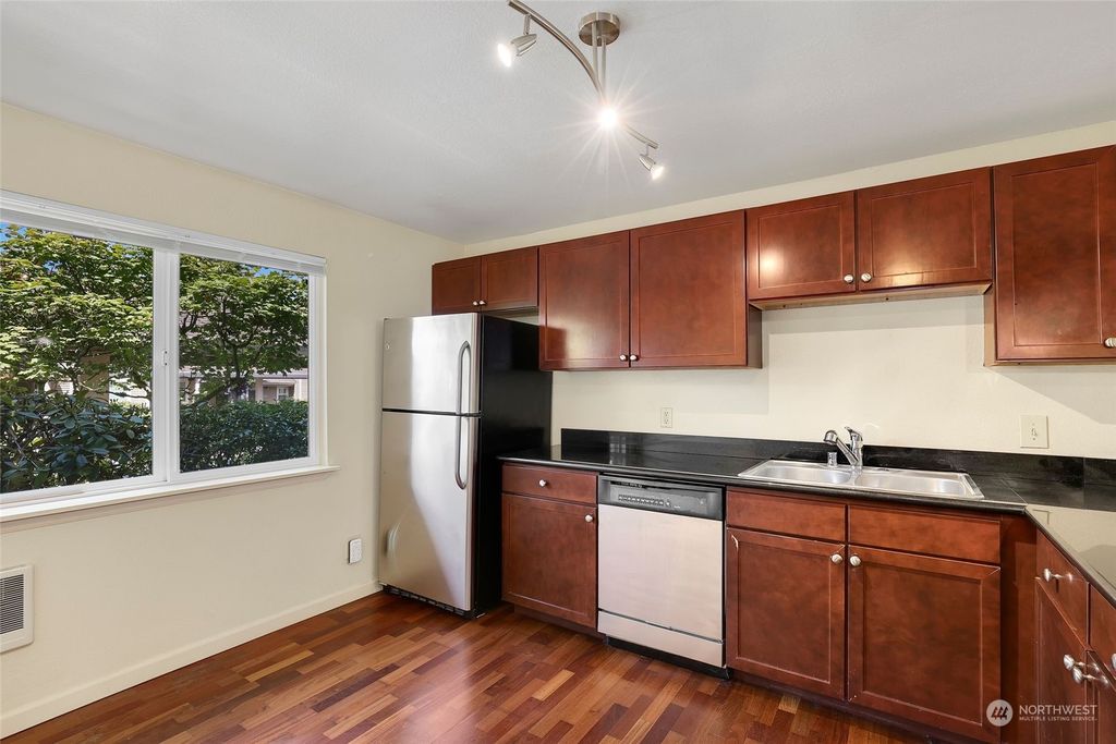 Photo of 1221 S 238th Lane #603, Des Moines, WA 98198 (MLS # 2144418)