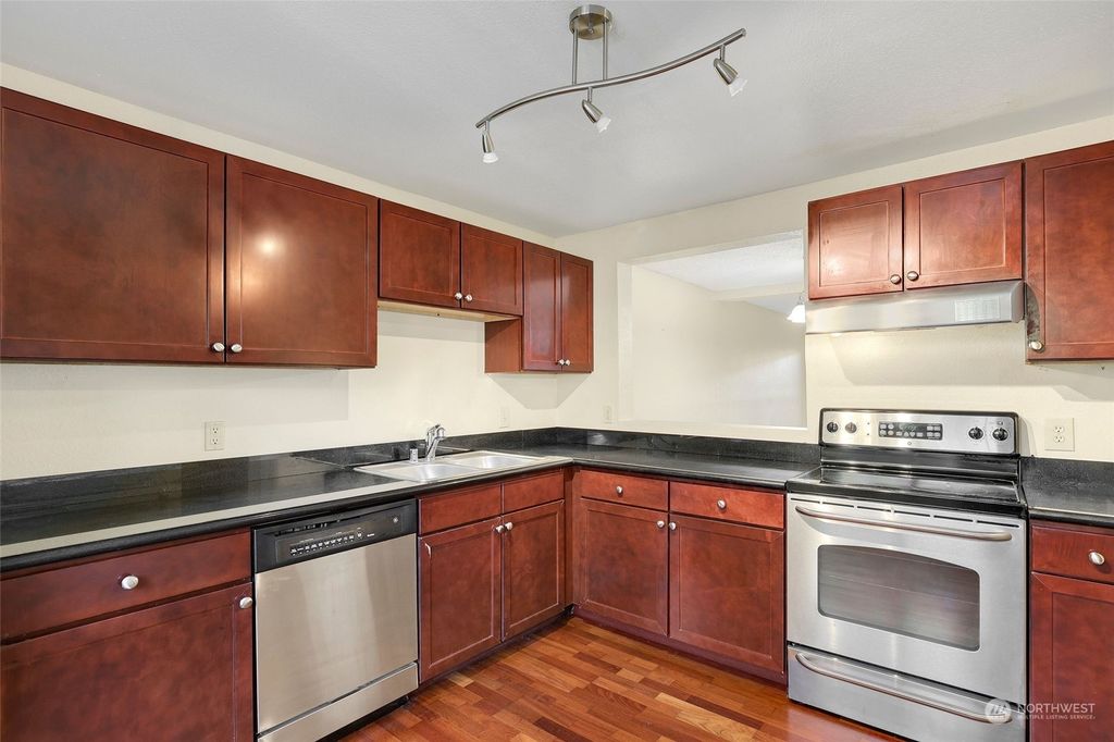 Photo of 1221 S 238th Lane #603, Des Moines, WA 98198 (MLS # 2144418)