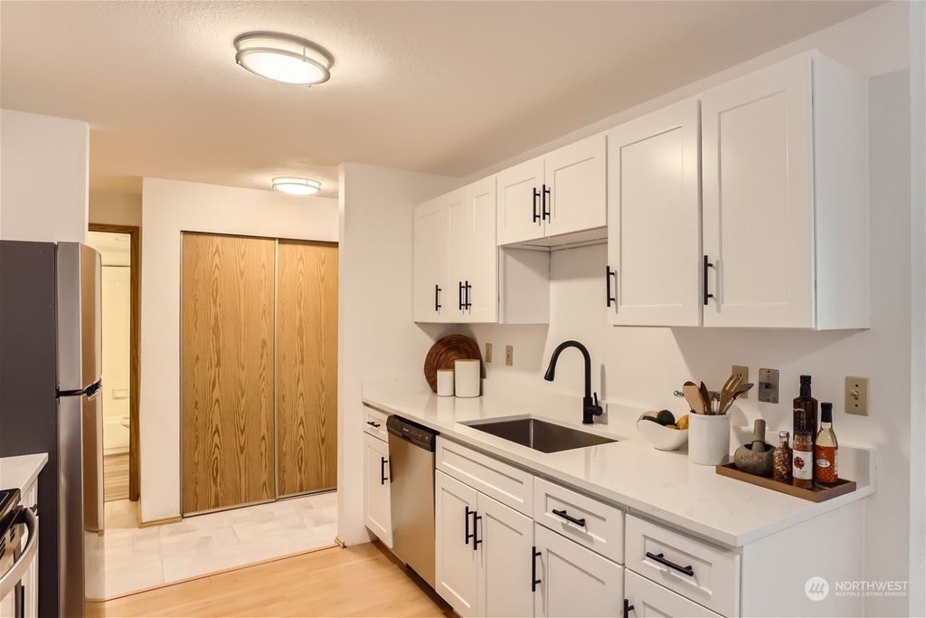 Photo of 9416 1st Ave Ave NE #102, Seattle, WA 98115 (MLS # 2247940)